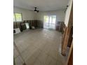 Bedroom interior with tile flooring, awaiting transformation, and direct access to the outdoors at 6000 Denver Ne St, St Petersburg, FL 33703