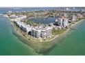 Gorgeous waterfront condo community with lush landscaping, pool, and water views at 6105 Bahia Del Mar Cir # 682, St Petersburg, FL 33715