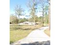 Secluded single-Gathering home on a large lot surrounded by mature trees and natural landscaping at 6153 La Pine Rd, Brooksville, FL 34602
