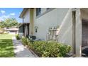 Close up of the exterior features of this condo, with well-maintained landscaping at 2941 Lichen Ln # B, Clearwater, FL 33760