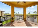 Beautiful balcony view showcasing lush greenery and ample sunlight at 4306 Bayside Village Dr # 201, Tampa, FL 33615
