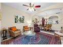 Cozy living room with comfortable seating and elegant décor and a view to the dining area at 6934 Duffy Ln, Tampa, FL 33616