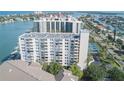 A high-rise condo complex sits on the waterfront with tennis courts and a view of the bay at 660 Island Way #206 # 206, Clearwater, FL 33767