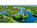 Beautiful condo community with lush landscaping, parking and a pond with fountains at 2333 Feather Sound Dr # B609, Clearwater, FL 33762