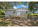 Well-maintained home with a new wooden porch, fresh paint, and a cozy curb appeal at 44912 Lacoochee Claysink Rd, Webster, FL 33597