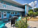 Inviting complex with outdoor seating, BBQ and a well-maintained outdoor area at 505 67Th Ave # 11, St Pete Beach, FL 33706
