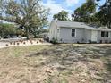 Charming single-story home with a newly landscaped front yard and neutral exterior paint at 921 Grand Central St, Clearwater, FL 33756