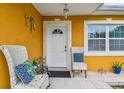 Inviting front porch with stylish seating and charming decor at 2818 Lorraine St, Tampa, FL 33614