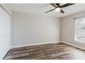 Clean and bright bedroom with neutral walls, modern wood-look flooring, and ample natural light at 706 E Gate Dr, Safety Harbor, FL 34695