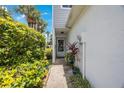 Welcoming front entry with well-maintained landscaping at 9205 Jakes Path, Largo, FL 33771