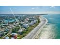 Breathtaking aerial view of property close to the ocean and beachfront at 12458 1St W St, Treasure Island, FL 33706