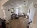 Main bedroom with tray ceiling, paneled accent wall, and neutral color scheme at 16027 Vine Cliff Ave, Hudson, FL 34667