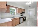 Kitchen featuring stainless steel appliances, practical countertops, and ample natural light at 1903 24Th St, Sarasota, FL 34234