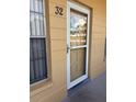 The home's entrance door offers a welcoming view and an inviting entrance at 2466 Ecuadorian Way # 32, Clearwater, FL 33763