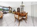 A spacious living room showcases tile floors and comfortable seating, perfect for relaxation and entertaining at 2621 Cove Cay Dr # 309, Clearwater, FL 33760