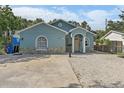 Charming one-story home with a stone facade, featuring a concrete driveway at 3201 36Th N Ave, St Petersburg, FL 33713