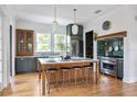 Elegant kitchen featuring large island, stainless steel appliances, and stylish finishes at 101 E Lambright St, Tampa, FL 33604