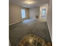 Living room featuring neutral paint, wall-to-wall carpet and natural light at 159 6Th Nw St, Largo, FL 33770