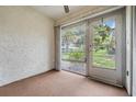 Enclosed sun room with large windows offering natural light and views at 2465 Northside Dr # 605, Clearwater, FL 33761
