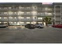 Well lit condo building at night with plenty of parking spaces at 3018 59Th S St # 405, Gulfport, FL 33707