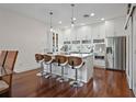 Modern kitchen with white cabinetry, stainless steel appliances, and a center island with seating at 325 5Th S Ave # 9, St Petersburg, FL 33701