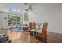 Bright living room with high ceilings, dining area, large windows, and comfortable seating at 325 5Th S Ave # 9, St Petersburg, FL 33701
