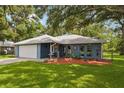 Charming single-story home with a well-manicured lawn and inviting curb appeal at 5633 99Th N Ter, Pinellas Park, FL 33782