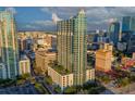 Aerial view of modern high-rise condominium building showcasing its architectural design and urban surroundings at 777 N Ashley Dr # 2513, Tampa, FL 33602