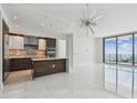 Modern kitchen featuring a large island, stainless steel appliances, and stylish cabinetry at 100 1St N Ave # 2304, St Petersburg, FL 33701