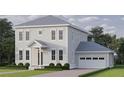 Charming two-story home with a well-manicured lawn, attached garage, and a welcoming entrance at 1008 Montrose N Blvd, St Petersburg, FL 33703