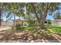 Charming single-story home featuring a well-maintained front yard and classic architectural details at 10730 52Nd N Ave, St Petersburg, FL 33708