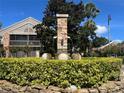 Community fountain with stone accents and lush landscaping, adding a touch of elegance to the surroundings at 2500 Winding Creek Blvd # B105, Clearwater, FL 33761