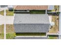 Aerial view of the home's roof, yard, and surrounding neighborhood at 30217 Double Dr, Wesley Chapel, FL 33545