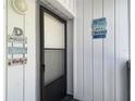 Charming entryway with coastal-themed decor, offering a warm, inviting welcome at 809 Bahia Del Sol Dr # 72, Ruskin, FL 33570