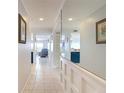 Bright hallway with tile flooring, showcasing open layout and access to living spaces at 809 Bahia Del Sol Dr # 72, Ruskin, FL 33570