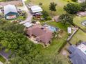 Expansive property featuring a pool, workshop, and ample space for recreational vehicles at 10502 Lake Williams Dr, Odessa, FL 33556