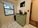 Bright kitchen nook with window offering natural light and outdoor views at 1286 Mission Hills Blvd, Clearwater, FL 33759