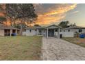 Charming single-story home with a carport and a well-maintained front yard at 3212 34Th N Ave, St Petersburg, FL 33713