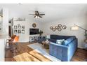 Comfortable living room with a large sectional sofa and stylish decor at 4510 Beaumaris Dr, Land O Lakes, FL 34638