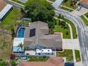 Aerial view of home with a private backyard pool and screened enclosure at 920 Tuscanny St, Brandon, FL 33511