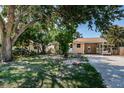 Charming single-story home with a covered carport and spacious front yard at 8184 49Th N Ave, St Petersburg, FL 33709