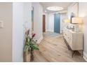 Inviting entryway with wood floors, accent furniture, and contemporary decor at 11 Baymont St # 505, Clearwater Beach, FL 33767