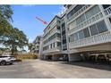 Well-maintained condo building with ample parking and lovely architecture at 139 Bluff View Dr # 405, Belleair Bluffs, FL 33770
