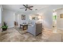 Cozy living room with neutral tones, lots of light, and tile floors at 201 W Alva St, Tampa, FL 33603
