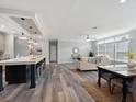 Open floor plan featuring dining area and living room with neutral walls and modern decor at 246 Gretna St, Port Charlotte, FL 33954