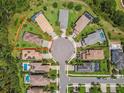 Aerial view of the lot and neighborhood showcasing the surrounding landscape and community layout at 30326 Ceasar Park Dr, Wesley Chapel, FL 33543