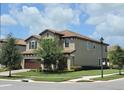 Charming home with a well-manicured lawn and mature trees on a corner lot at 3984 Maurice Ave, Odessa, FL 33556