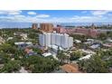 Expansive aerial view featuring the city, waterfront, and surrounding residential areas amid lush greenery at 700 Beach Ne Dr # 606, St Petersburg, FL 33701