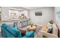 Bright and inviting living room with modern decor and bar seating at 120 W Sligh Ave, Tampa, FL 33604