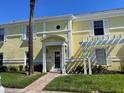 Charming condo with an elegant entrance and manicured lawn at 219 Pompano Se Dr # D, St Petersburg, FL 33705